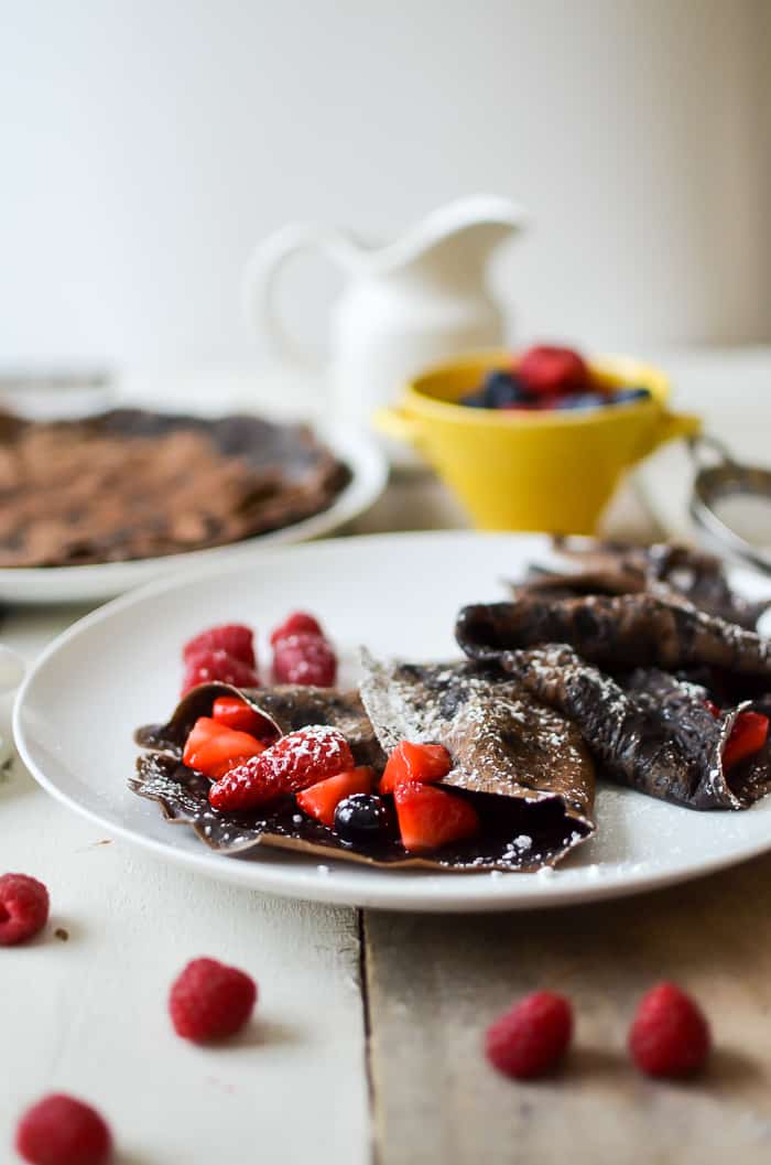 Chocolate crepes with berry compote