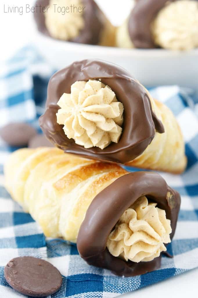 Pumpkin Chocolate Cream Horns - A buttery and flaky pastry horn filled with sweet pumpkin cream and dipped in dark chocolate.