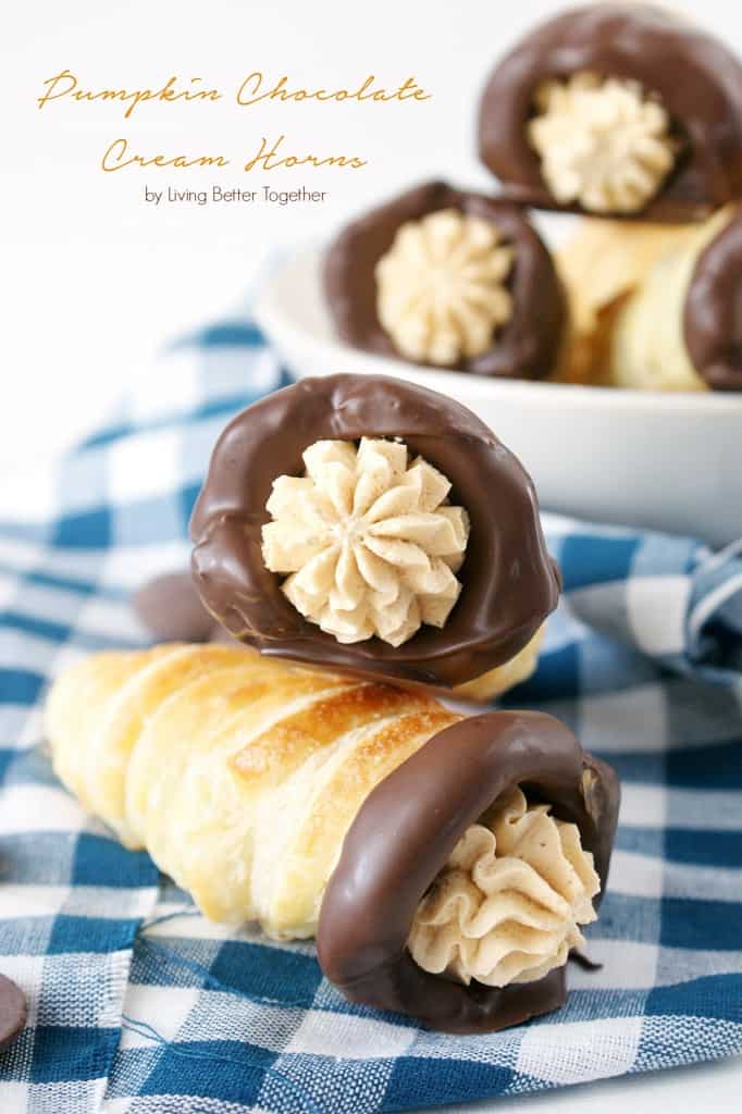Pumpkin Chocolate Cream Horns - A buttery and flaky pastry horn filled with sweet pumpkin cream and dipped in dark chocolate.