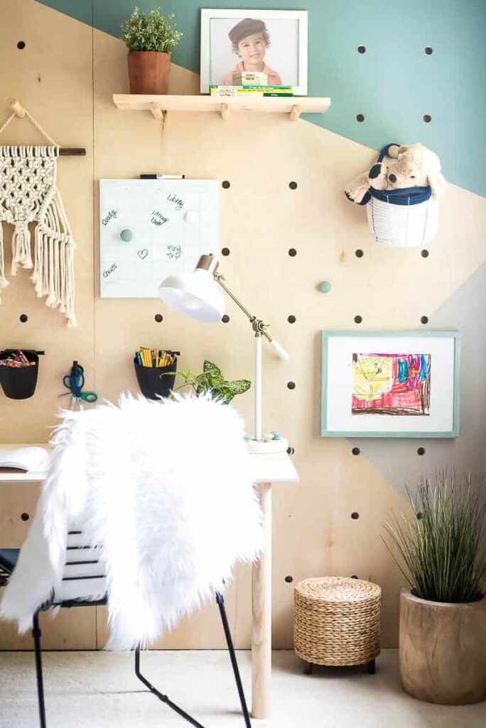 Holy WOW! This amazing DIY giant plywood pegboard wall is so easy to make and it looks super cool!