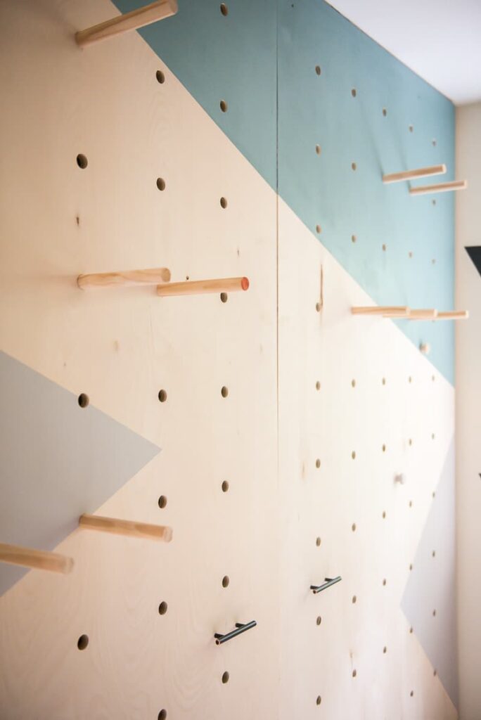 Holy WOW! This amazing DIY giant plywood pegboard wall is so easy to make and it looks super cool!