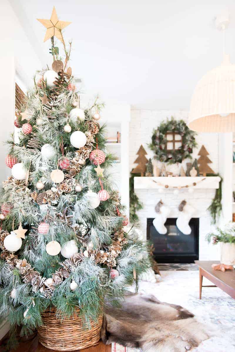 slim christmas tree in basket