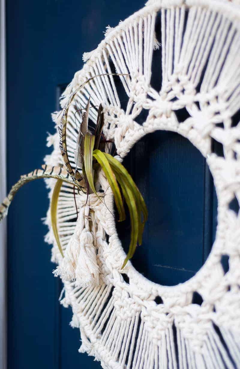 Macrame wreath for fall on blue door