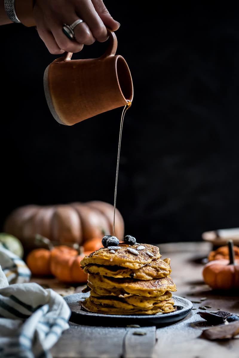 Pumpkin pancakes with a drizzle of syrup