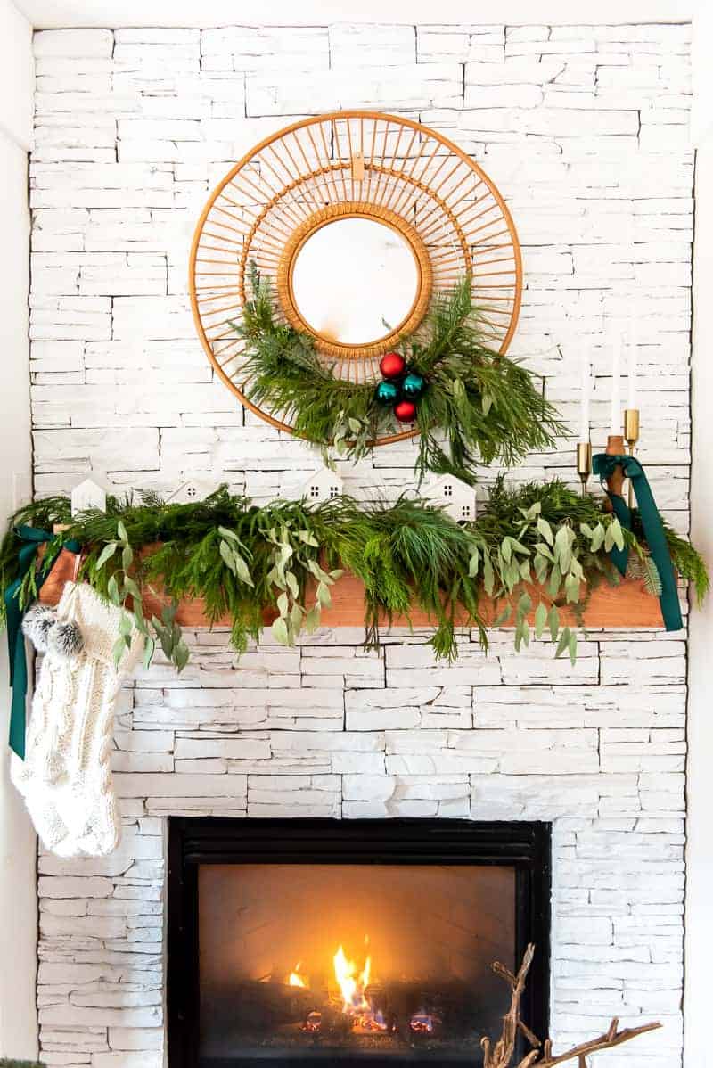 Christmas Mantel decorated with fresh greens