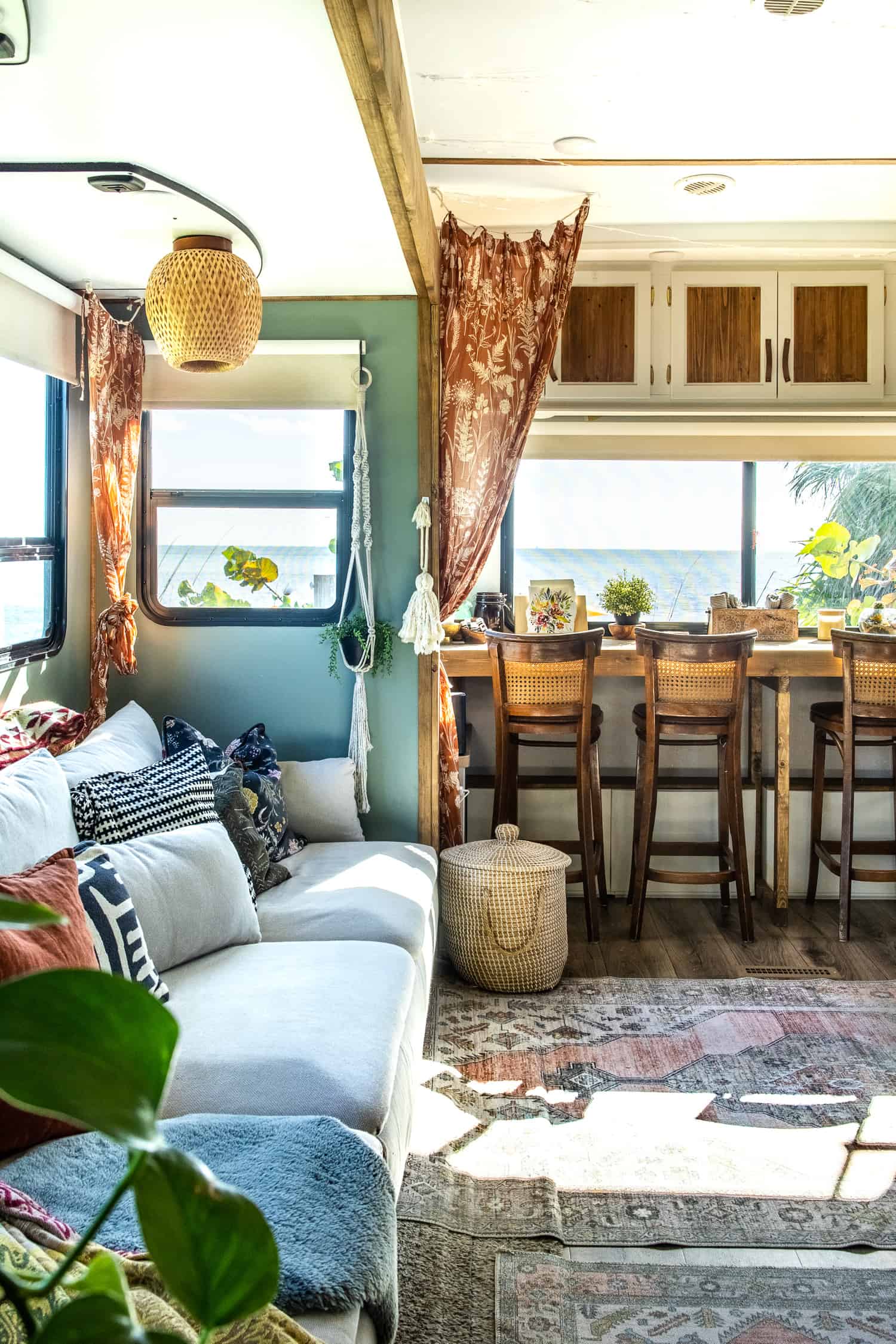 Amazing eclectic style camper renovation with vintage accents and lots of style.